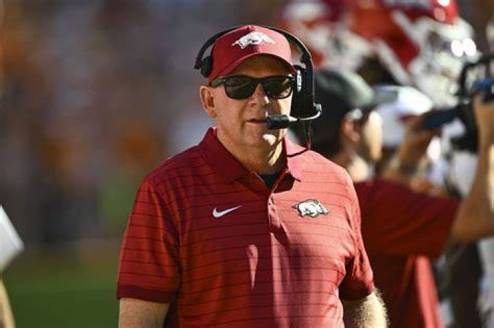 Arkansas Coach Bobby Petrino (shown with wife Becky), in a
